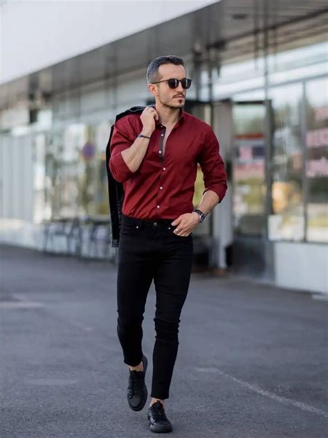 maroon shirt with black pants.